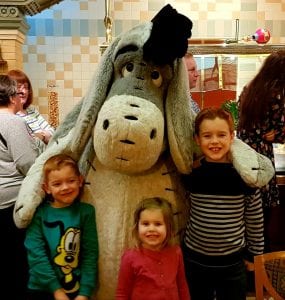 inventions disneyland paris three children stood with eeyore